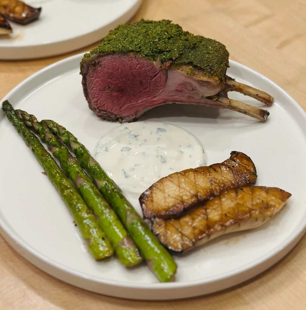 Dish at Its Fine: herb-crusted lamb with asparagus, mushrooms, and sauce.